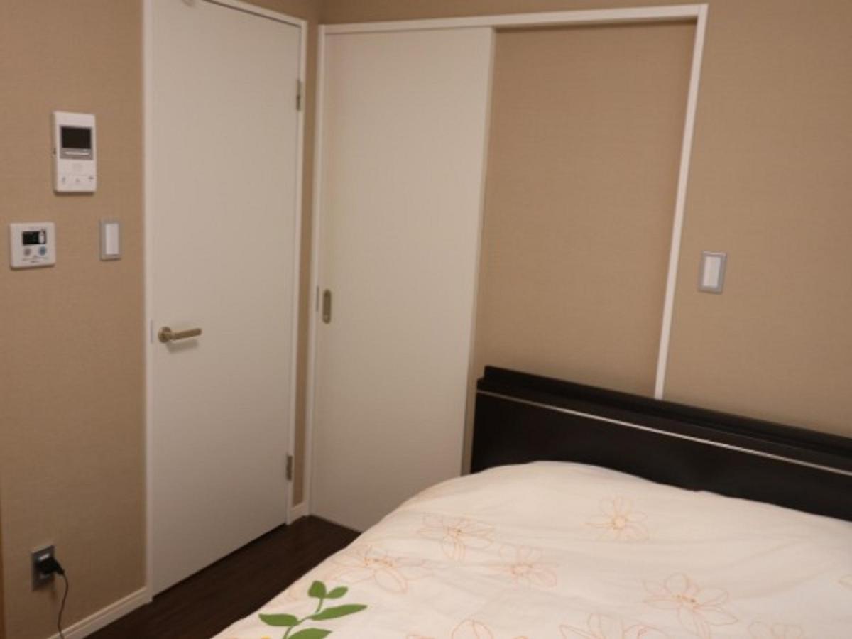 Aparthotel Mr. Kinjo In Makishi à Naha Chambre photo
